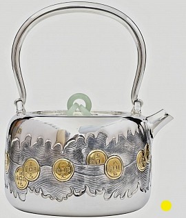 Fine silver teapot with coin motif and jade accents £5500 order number 080