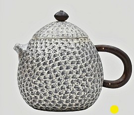 Hammered sterling silver teapot with dark wood handle £1500 order number 508
